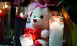 A vigil with teddy bears, flowers, and candles is held one day after a 7-month-old girl, i...