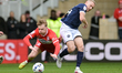 Tommy Conway of Middlesbrough FC is challenged by Casper de Norre of Millwall FC during th...