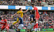 Anthony Patterson of Millwall FC misjudges the cross as Dael Fry of Middlesbrough FC heads...