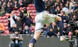 Josh Coburn of Millwall FC celebrates his second goal of the afternoon during the Sky Bet...