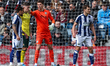 West Bromwich Albion's goalkeeper Josh Griffiths directs his defense as Wrexham AFC prepar...
