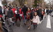 Catholic faithful walk through the streets and avenues of Brooklyn during the traditional...