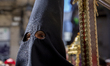 Penitents of the Hermandad de la Macarena and the Gran Poder brotherhood march along La Ra...
