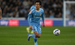 Tatsuhiro Sakamoto of Coventry City moves forward during the Sky Bet Championship match be...