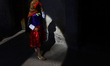 A Matacuero, a masked figure, inside a chapel in eastern Morelos State, Mexico, prepares t...