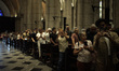People participate in the Procession of the Dead Lord at the Metropolitan Cathedral on the...