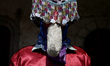 A Matacuero, a masked figure, inside a chapel in eastern Morelos State, Mexico, prepares t...