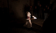 Young hooded penitents from a local religious confraternity, known as confratelli, wait fo...