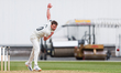 Tom Lawes of Surrey bowls during the Rothesay County Championship match between Warwickshi...