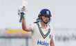 Rob Yates of Warwickshire celebrates scoring a half-century during the Rothesay County Cha...