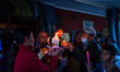 Catholic faithful light candles during the Easter Vigil candle procession at the church in...