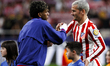 Lamine Yamal of FC Barcelona and Antoine Griezmann of Atletico de Madrid during the La Lig...