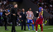 Lamine Yamal of FC Barcelona and Diego Pablo Simeone of Atletico de Madrid during the La L...