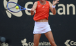 Marie Bouzkova of the Czech Republic plays during a match against Jazmin Ortenzi of Argent...