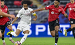 Abdullah Yousef of Al Rayyan SC and Akram Afif of Al Sadd SC compete during the Qatar Clas...