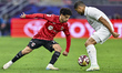 Khalid Ali Sabah (L) of Al Rayyan SC and TPaulo Silva (R) of Al Sadd SC compete during the...