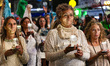 People participate in a torch march in defense of glaciers in Buenos Aires, Argentina, on...
