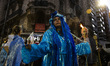 People participate in a torch march in defense of glaciers in Buenos Aires, Argentina, on...