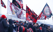 Toronto FC fans raise flags to support the team during a Major League Soccer game between...