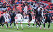 Toronto FC striker Josh Sargent (#9) jumps to head the ball after a corner kick during a M...