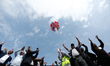 Christian devotees participate in a mass prayer gathering at Dasarath Rangasala Stadium in...