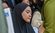 Family members of Infantry Major (Anm) Zulmi Aditya Iskandar weep during a funeral ceremon...