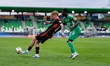 Samuel Grygar of MFK Ruzomberok and Severin Tatolna of FC Tatran Presov in action during t...