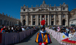 A Swiss Guard looks around the crowd during the Easter Mass in St. Peter's Square on April...