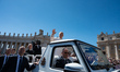 Pope Leo XIV waves to the faithful at the end of the Easter Mass in St. Peter's Square in...