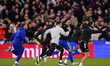 Leeds United players celebrate winning a penalty shootout during the Emirates FA Cup Quart...