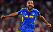 Dominic Calvert-Lewin of Leeds United celebrates a quarter-final win on penalties with awa...