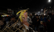 A pinata of US President Donald Trump is seen in the La Merced neighborhood during the tra...