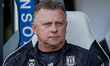 Mark Robins, manager of Stoke City, sits on the bench prior to kick-off during the Sky Bet...