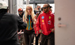 Anya Taylor-Joy and Scuderia Ferrari HP driver #44 Lewis Hamilton walk through the paddock...