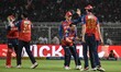 Xavier Bartlett of Punjab Kings celebrates taking the wicket of Cameron Green during an In...