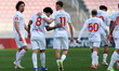 Andrea Zammit (second from left) of Valletta is celebrated by teammate Jake Azzopardi afte...