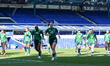 Manchester City players head to the dressing room at the end of their warm-up during the A...