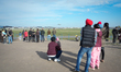 Visitors are seen at a spotters hill near Chopin airport in Warsaw, Poland on 05 April, 20...