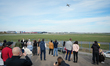 Visitors are seen at a spotters hill near Chopin airport in Warsaw, Poland on 05 April, 20...