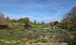 People in a landscaped garden and pond are seen at Killesberg Park in Stuttgart, Baden-Wue...