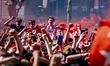 PSV Eindhoven supporters gather at Stadhuisplein to celebrate the team's Eredivisie champi...