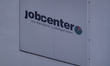 A sign and building of the Jobcenter Vorderpfalz-Ludwigshafen are seen in Ludwigshafen am...