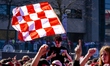 PSV Eindhoven supporters gather at Stadhuisplein to celebrate the team's Eredivisie champi...