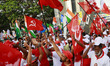 Supporters of the Left Democratic Front (LDF) and the United Democratic Front (UDF) celebr...