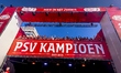 PSV Eindhoven players appear on the balcony during the celebration of their Eredivisie cha...