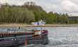 Cargo ships navigate the Rhine near Speyer, Rhineland-Palatinate, Germany, on April 3, 202...