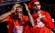 PSV Eindhoven players Ryan Flamingo and Ismael Saibari celebrate the team's Eredivisie cha...