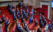 French right-wing MPs applaud during a session of questions to the government at The Natio...