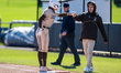 Lola Fasano of the Lehigh Mountain Hawks stands at first base during an NCAA softball game...