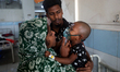 Children infected with measles receive treatment at Mugda Hospital in Dhaka, Bangladesh, o...